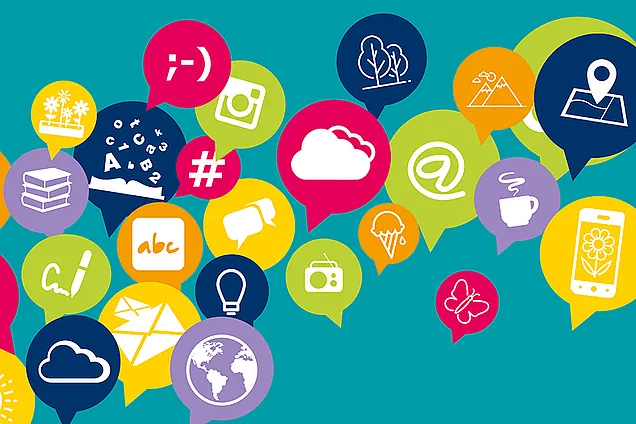 türkiser Hintergrund, bunte runde Sprechblasen in den je ein weißes Icon zu sehen ist. Die Icons sind in Form von zB einem @-Zeichen, einem Smiley-Gesicht, einem Buch, einer Wolke, Buchstaben, einer Weltkugel, etc.